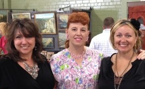 With our fellow vendor Jenny. If you ever need vintage clothing or jewelry sets, she's your vendor.