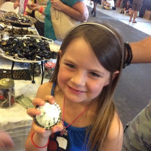 I hid a little mirror in the bowl of buttons & she randolmy found it. It was FREE & she was excited to win it. 