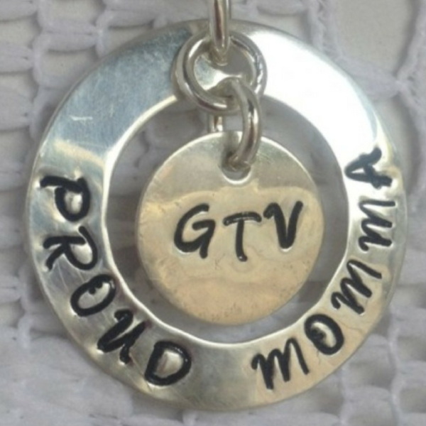 Kim’s Proud Momma Charm – The hand stamped discs are by my dad Jake